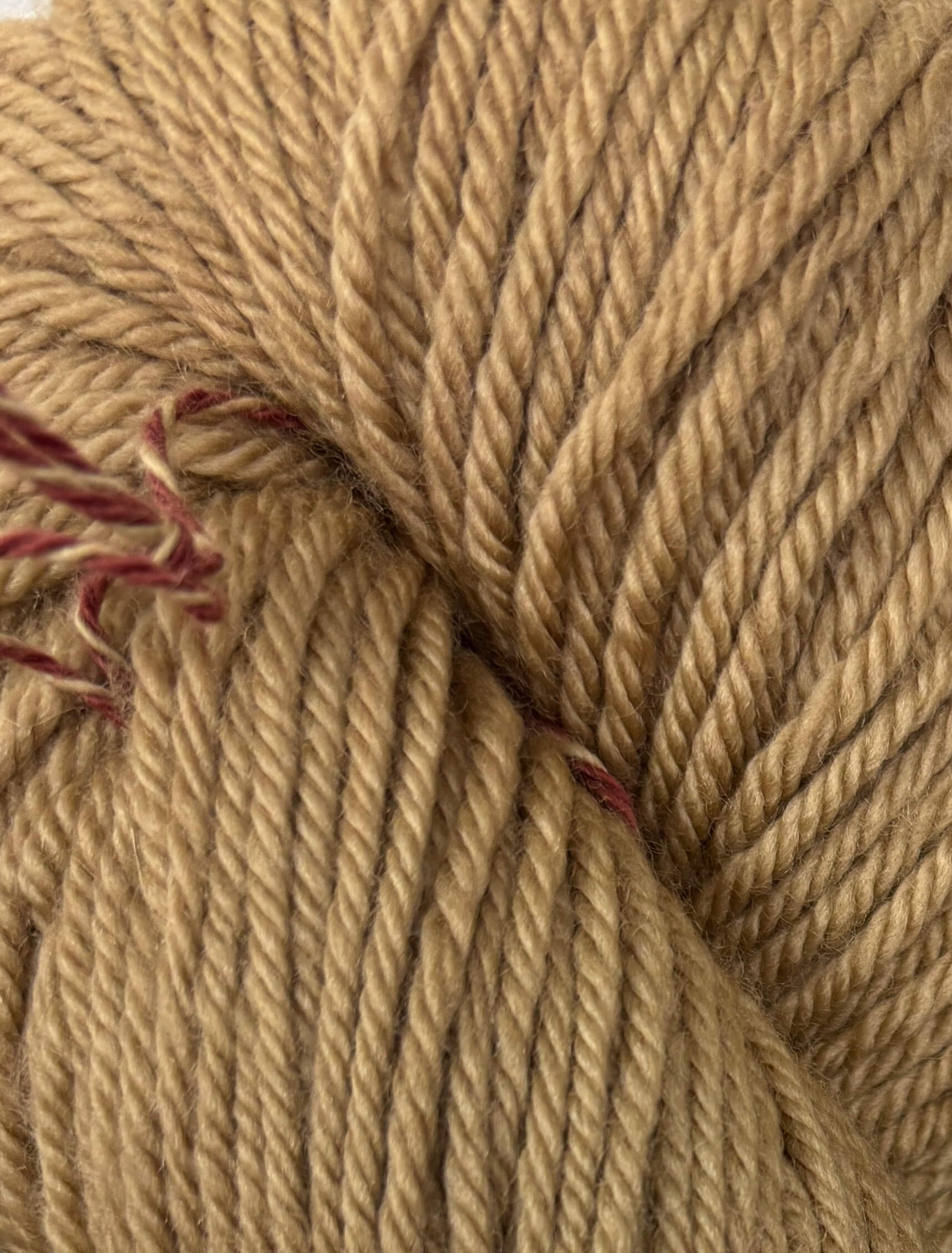 Close-up of brown yarn with a slight sheen