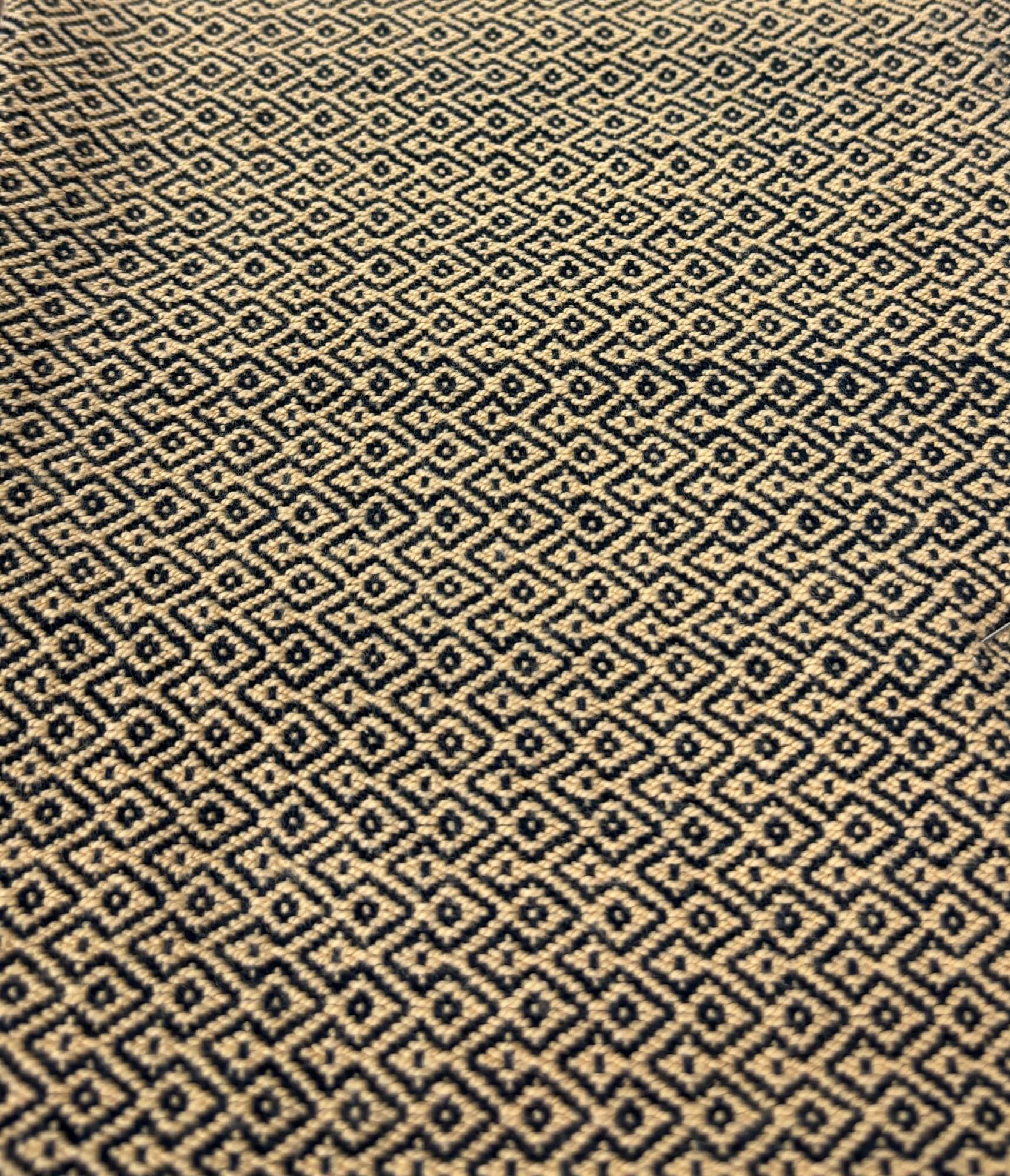 Patterned fabric with a geometric design in beige